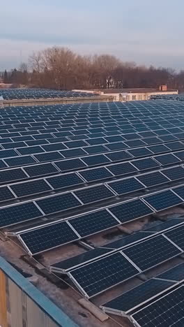 Solar panels on rooftop. Aerial view of solar panels on factory roof