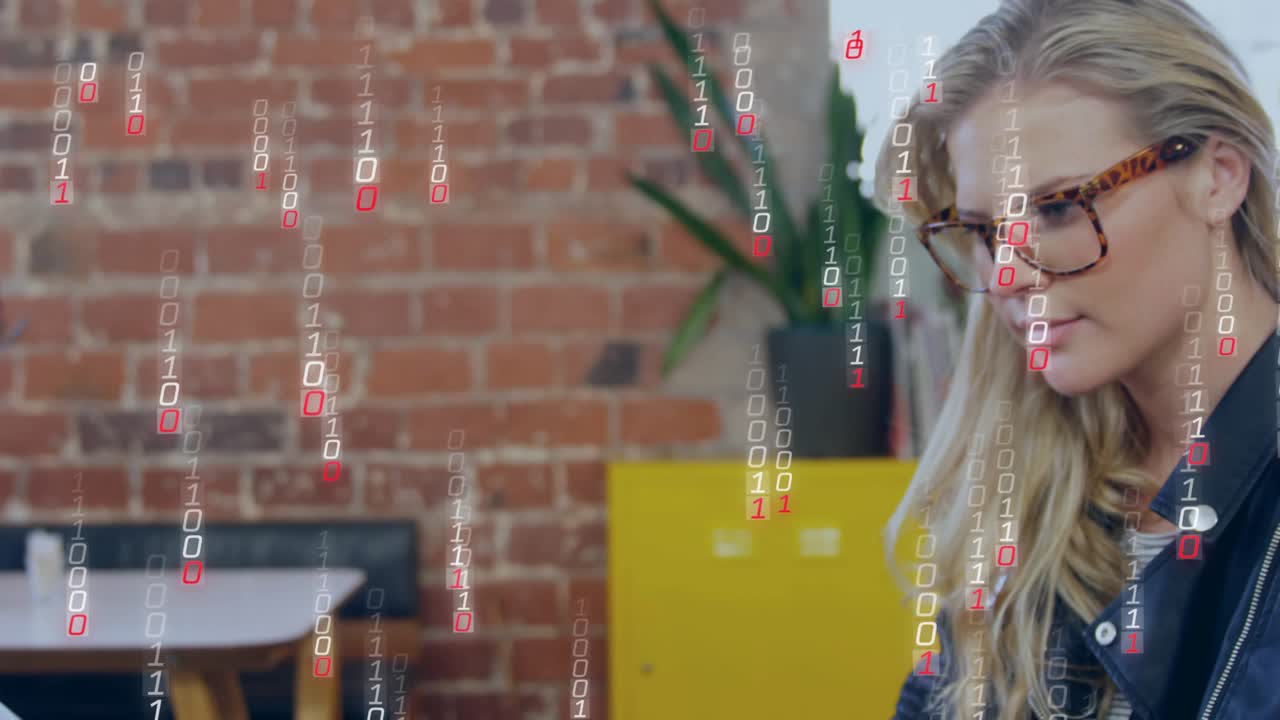 Woman picking smartphone from laptop at cafe causing binary stream shifting gaze for data analytics