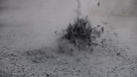 extreme close-up of escalating bubbles on the surface of hot mud pools in new zealand