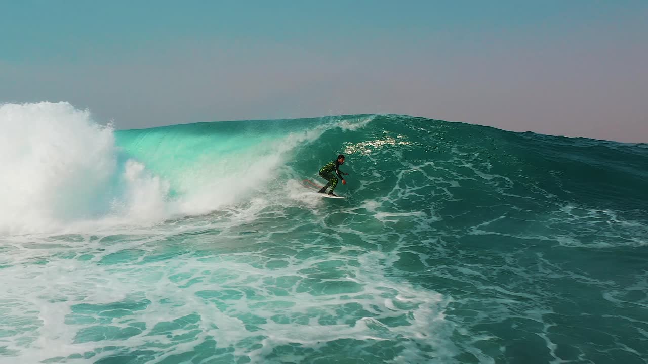 Surfer Surfing Big Wave Barrel Tube In Ocean Australia Aerial Slow Motion Water Sports Video