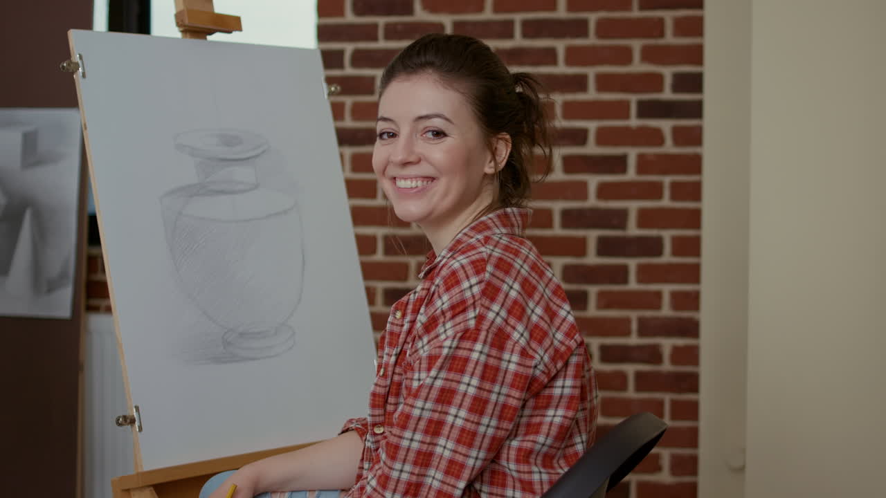 Portrait of young student learning to draw vase masterpiece