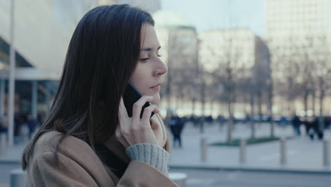 woman talking on phone at 9/11 memorial