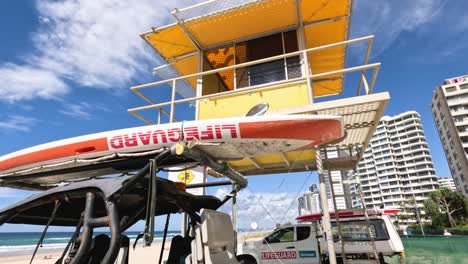 lifeguard tower with beach and buildings