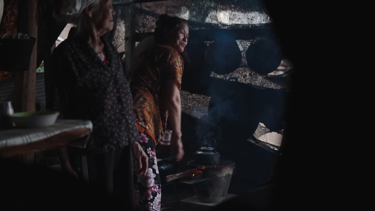 Two Elderly Women Cooking Indoors