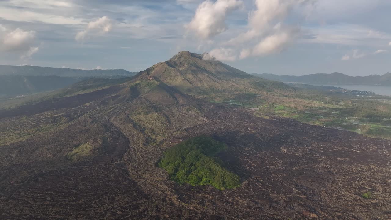 Beautiful aerial view of Mount Batur and scenic volcanic landscape of Bali, Indonesia.