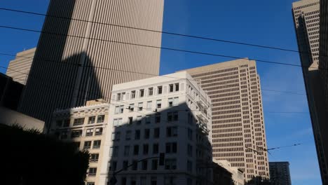 Towers and Office Buildings in Downtown San Francisco, California USA, View From Moving Car on Market Street