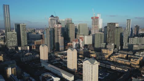 aerial trucking shot of skyscrapers of london cbd, canary wharf, uk