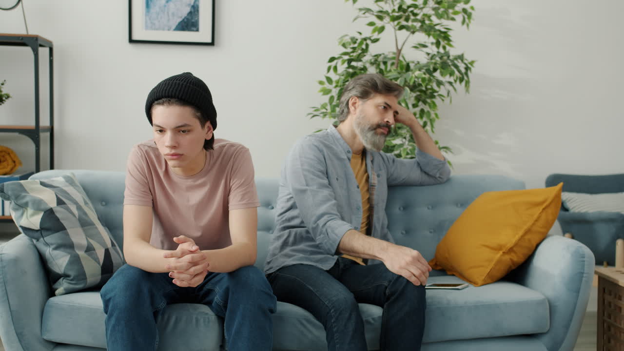 Teenager and Father in Disagreement