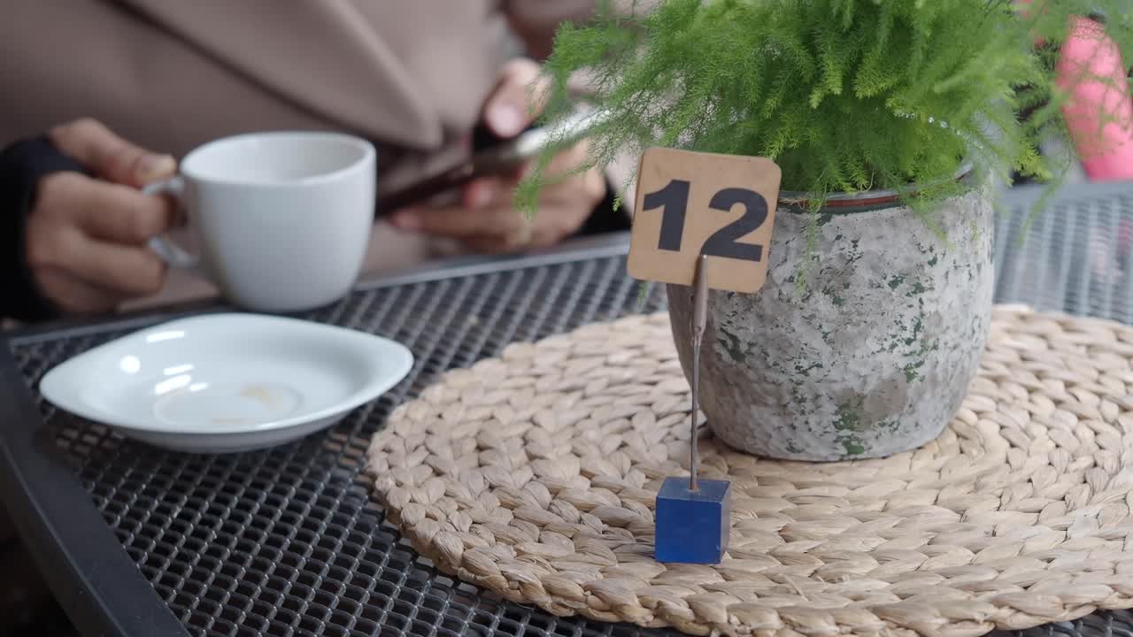 Coffee and Table Number at a Cafe