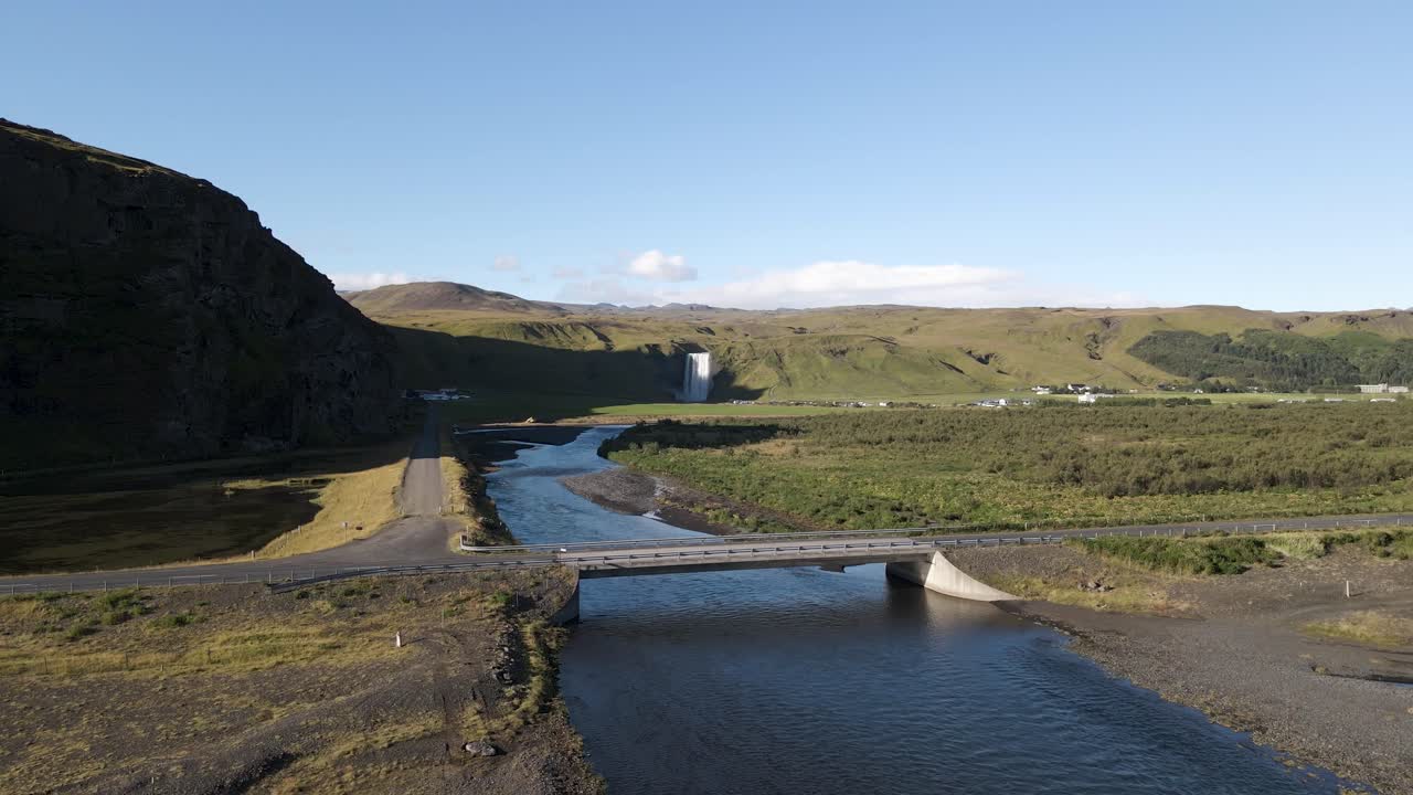 Experience Sk&oacute;gafoss Waterfall from above with our 4K drone footage, highlighting Iceland's epic scenery