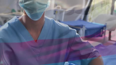 animation of flag of russia waving over surgeons in operating theatre