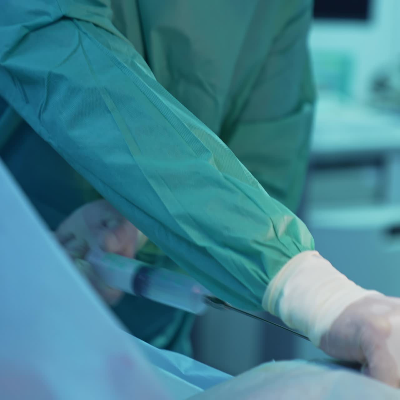 Filtration and pumping of fat from abdomen. Professional doctor performing liposuction to a patient in hospital. Surgeon correcting body shape during abdominal surgery