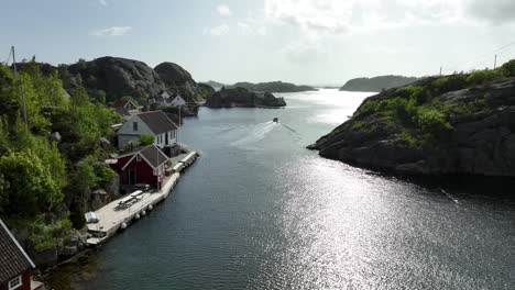 drone flyover of the historic outport showcasing old boathouses and preserved coastal culture.