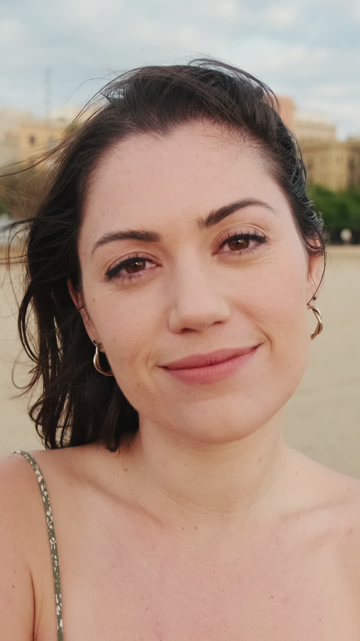 Portrait of a smiling woman on the beach
