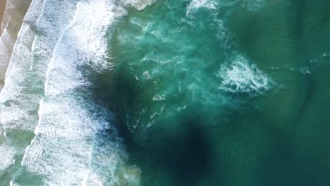 waves-from-above,-beautiful-bordeira-beach-in-algarve-portugal