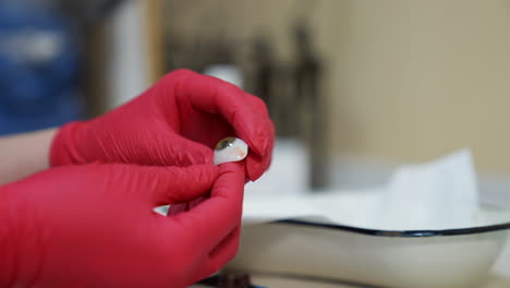 making of ocular prosthesis. close up view of making human eye prosthesis