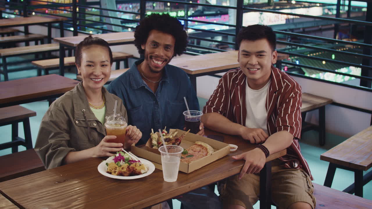 Portrait of Diverse People at Outdoor Cafe with Pizza, Snacks and Drinks