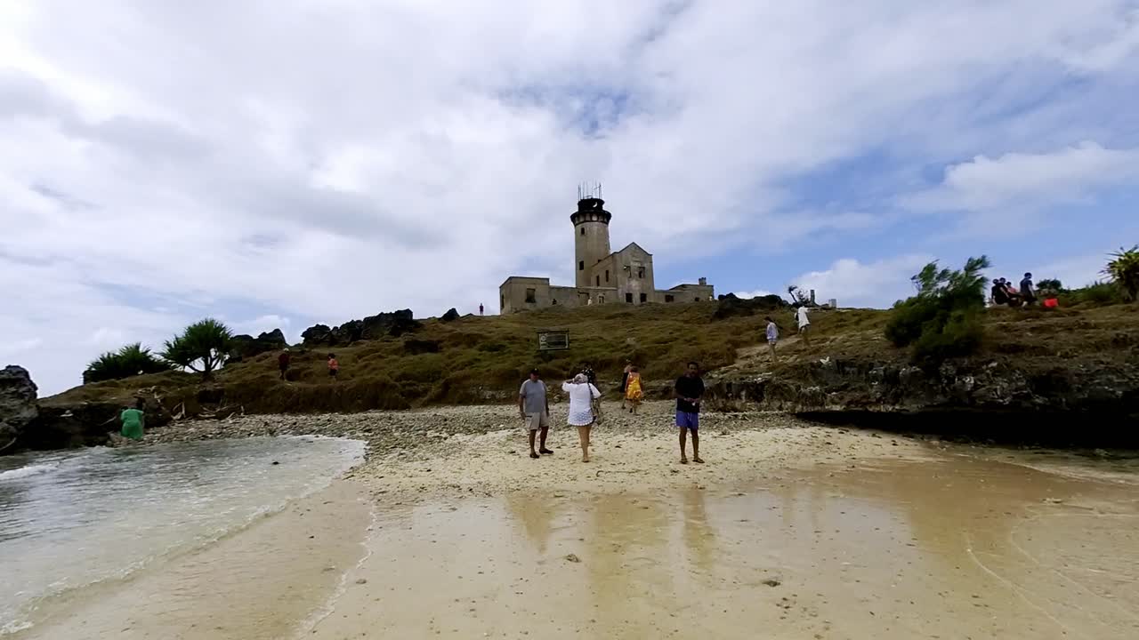 A stunning panoramic view of the arrival at the picturesque lighthouse island in Mahebourg, Mauritius, nestled in the Indian Ocean.