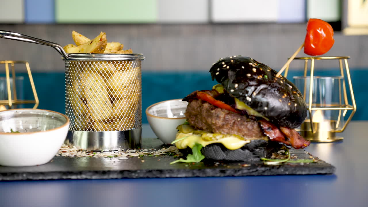 Delicious Black Burger with Fries
