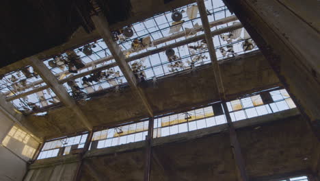 view of the ceiling in an abandoned factory building