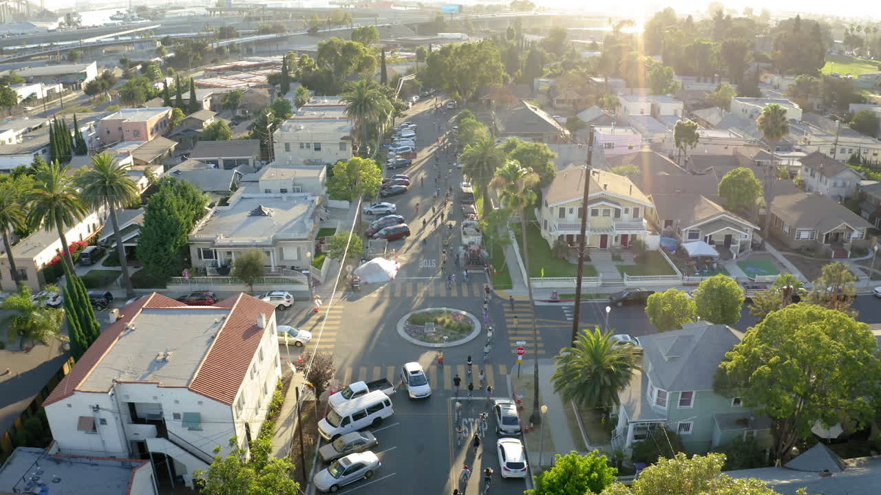 Aerial View of a Residential Street Event at Golden Hour