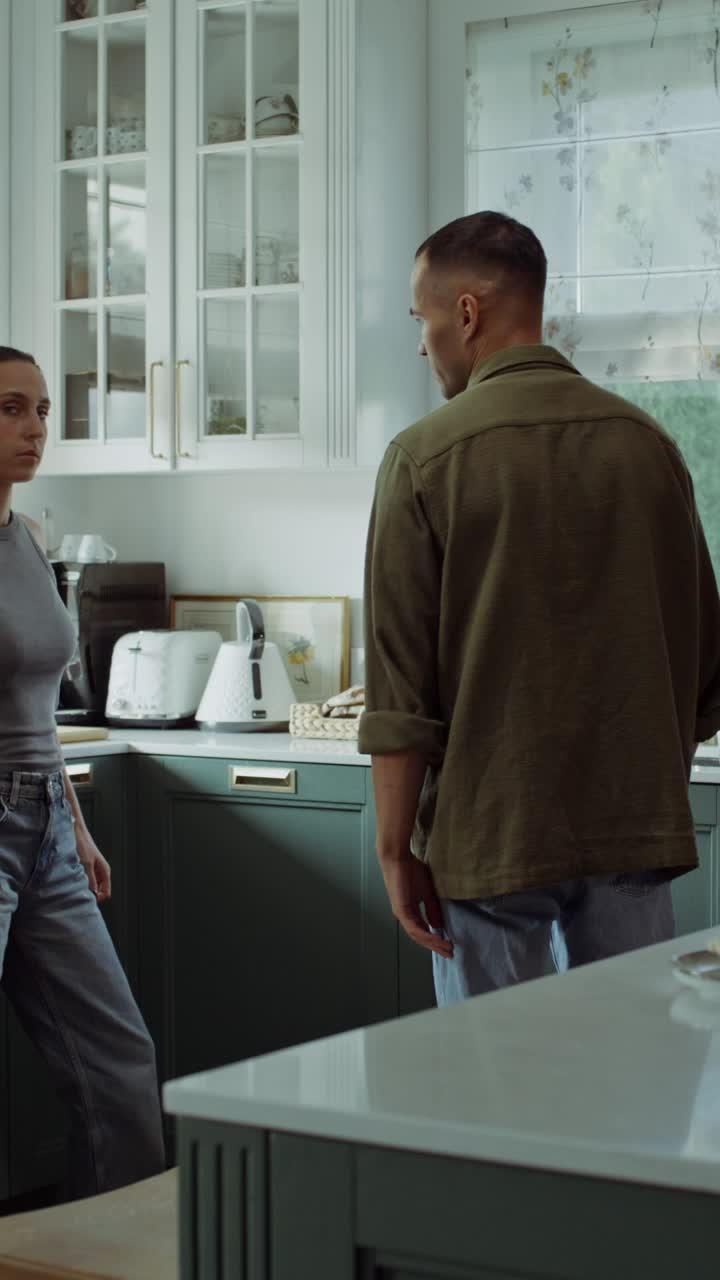 Couple Arguing in Kitchen