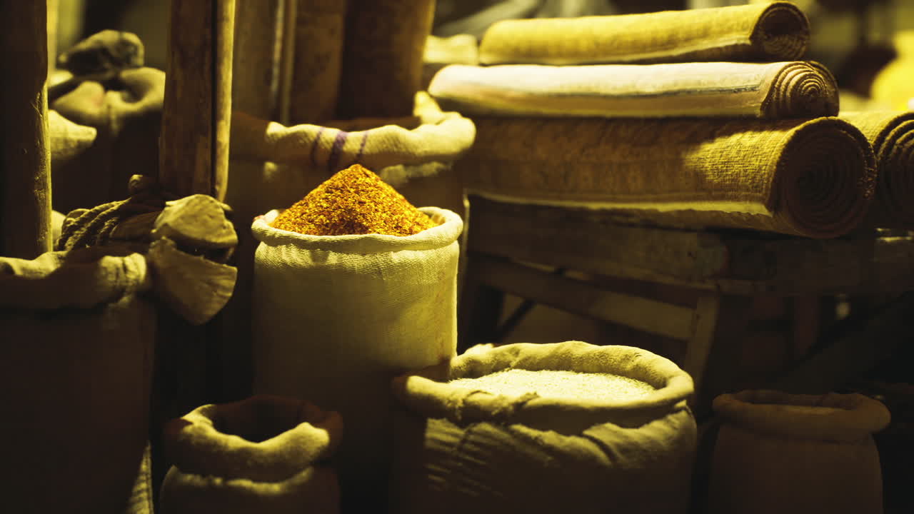 Cozy marketplace showcasing fragrant herbs and colorful powders visibly arranged
