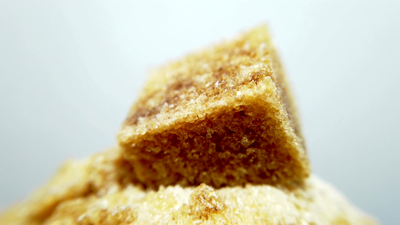 azúcar marrón en primer plano, en bucle 360 video macro