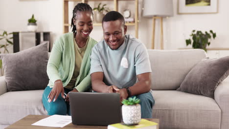 Laptop,-video-call-and-black-couple-on-a-sofa