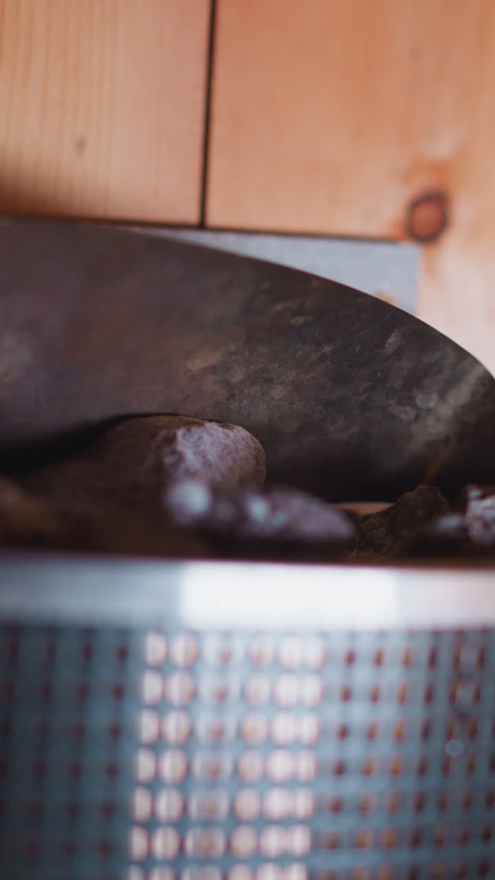 Woman uses drops of essential oil in sauna closeup. Oils help creating air in sauna that positively affects lungs and creates pleasant odor for visitors