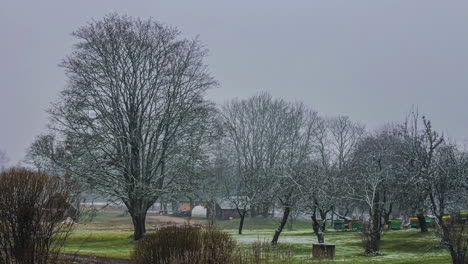 Static-shot-of-a-small-village-from-autumn-to-winter-in-timelapse