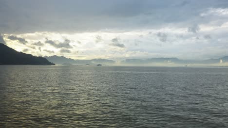 hiroshima bay with clouds and mist near miyajima, japan ferry point of view
