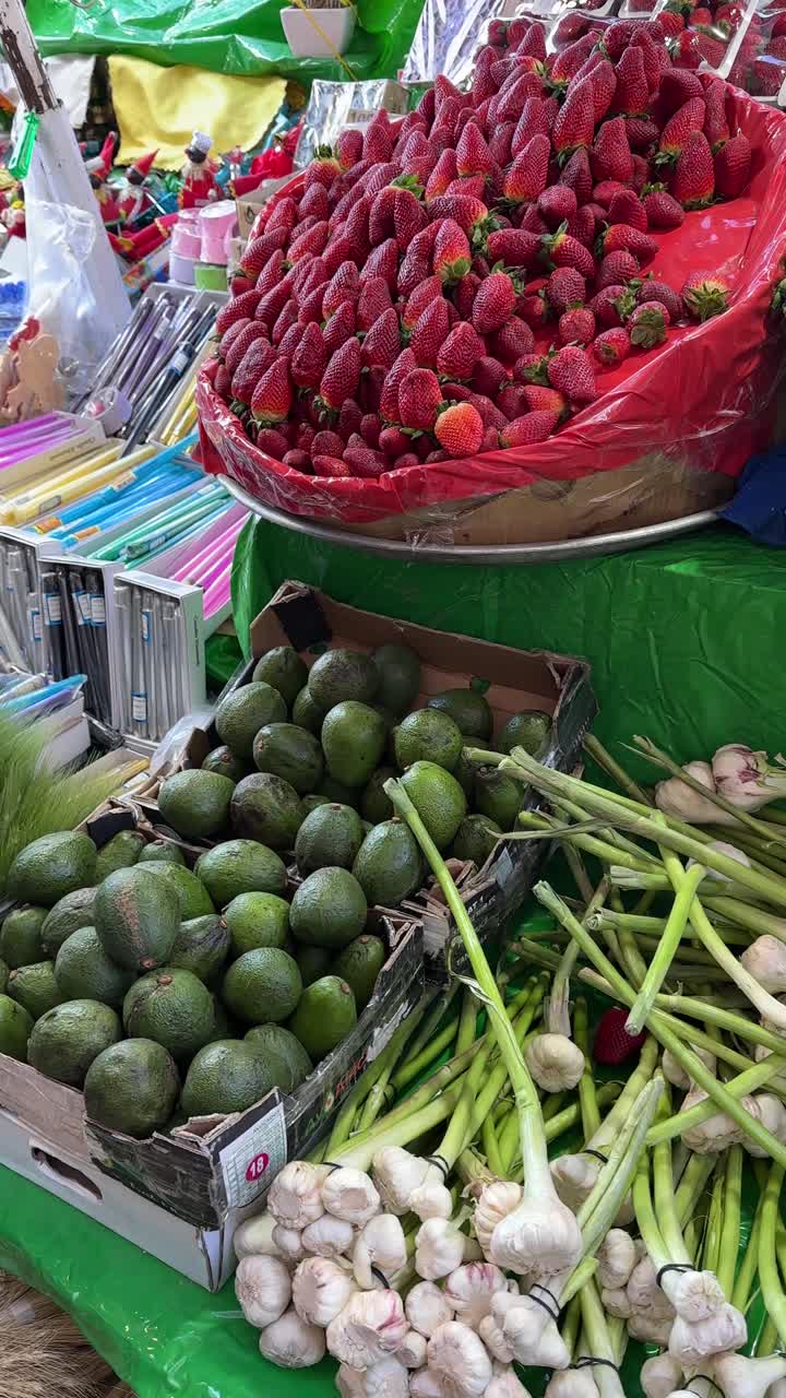 Raw almond and strawberries in grocery store Iran Tehran Tajrish agriculture bazaar farmers market fresh fruit healthy organic produce product colorful lifestyle vendor traditional stall green market