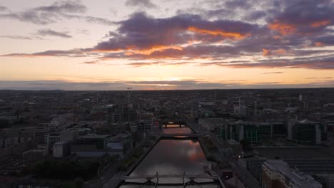 stunning sunset colours at river liffey 02- 4k cinematic drone footage - co.dublin - ireland