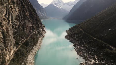 lake paron peruvian andes aerial drone between mountains, peru crystalline water andean cordillera blanca, huascaran national park