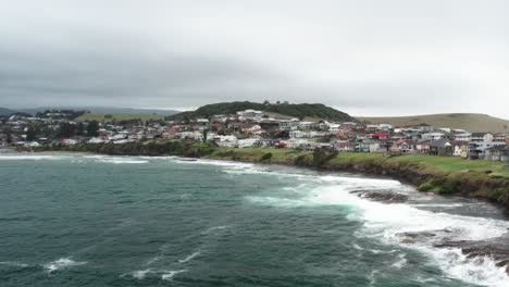 Aerial-drone-shot-around-the-coastal-town-of-Gerroa-on-a-stormy-day-in-the-south-coast-of-New-South-Wales,-Australia