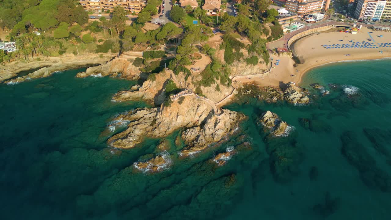 Circular aerial view of Cala Banys on the beach of Lloret De Mar, Costa Brava