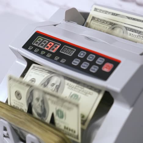 counting dollar banknotes. money counting equipment for paper money calculation