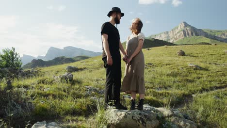 couple enjoying a scenic view from the mountains