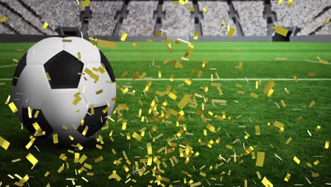 Animation-of-gold-confetti-falling-over-football-in-sports-stadium