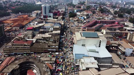 crowded city landscape in capital of cameroon, yaounde - aerial drone bird's eye view