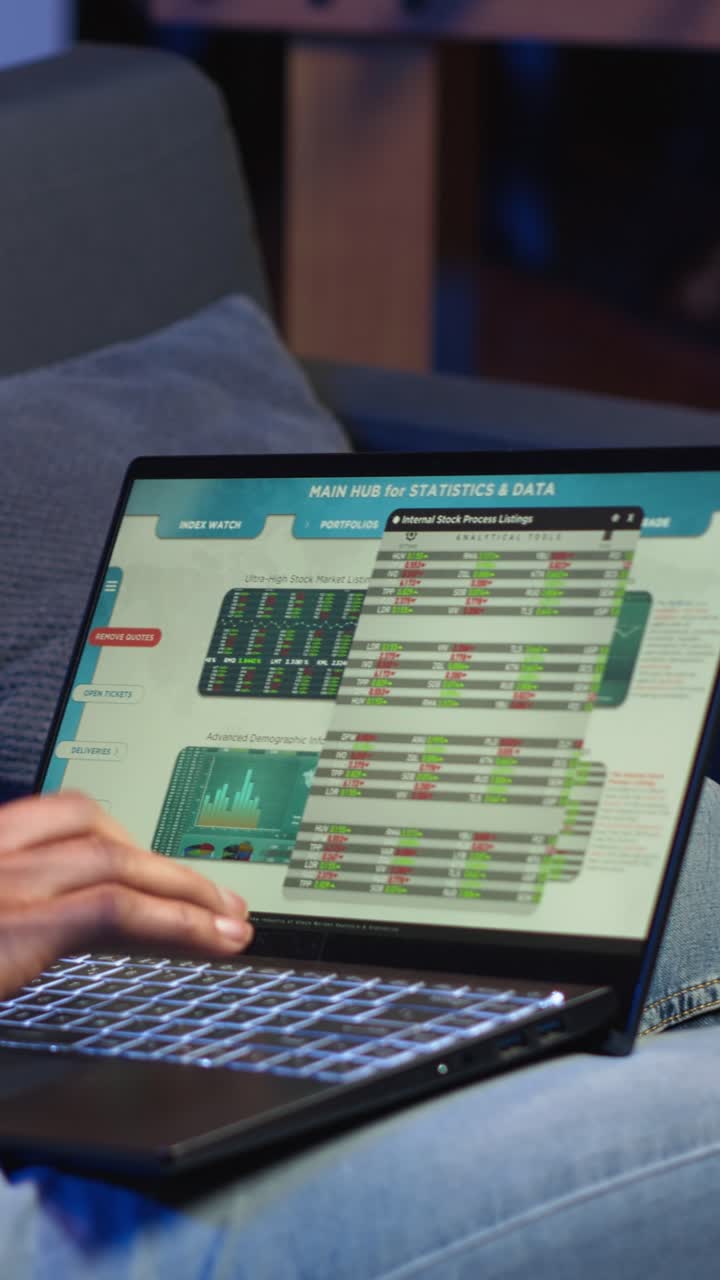 Vertical Video African american expert closing the monthly revenue balance on web platform