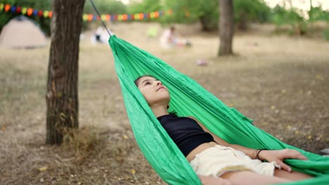 girl relaxing in a hammock