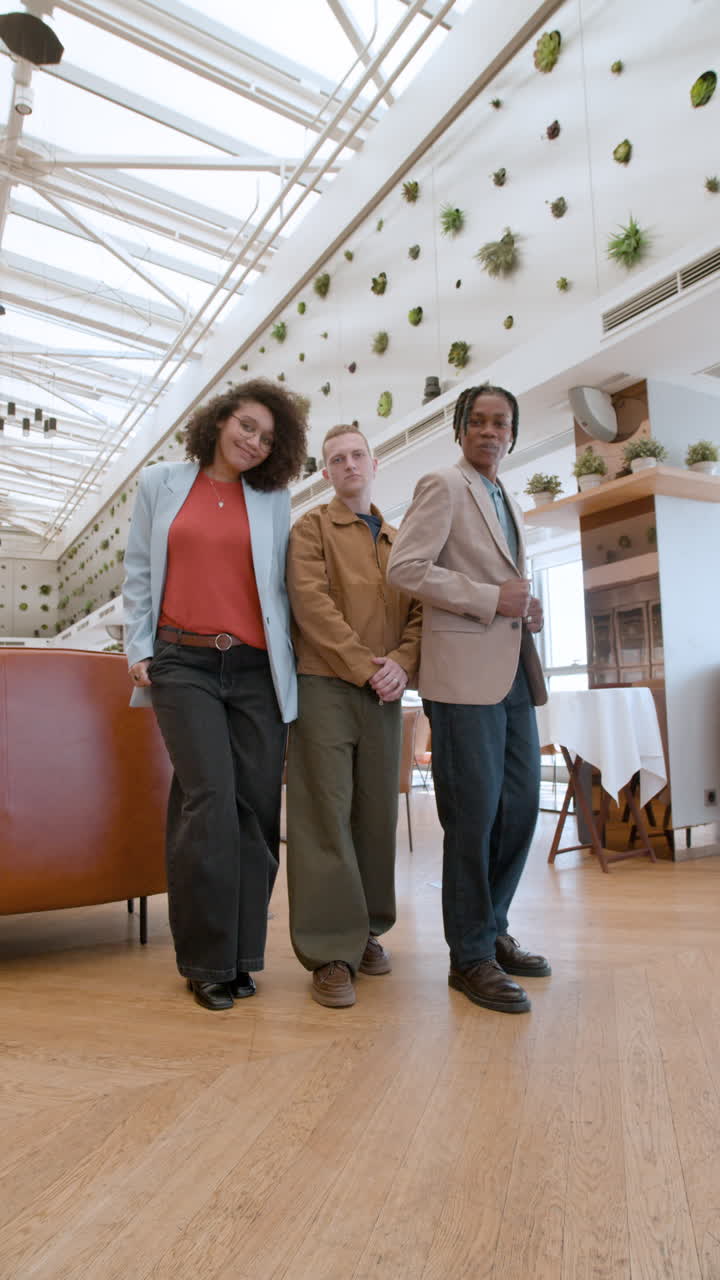 Three People in a Modern Cafe