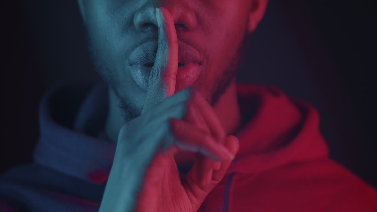 Man with Finger on Lips, Neon Lights