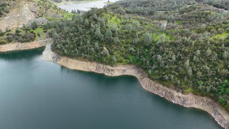 bird's eye panning view of the don pedro reservoir. shot on a dji air 3s.