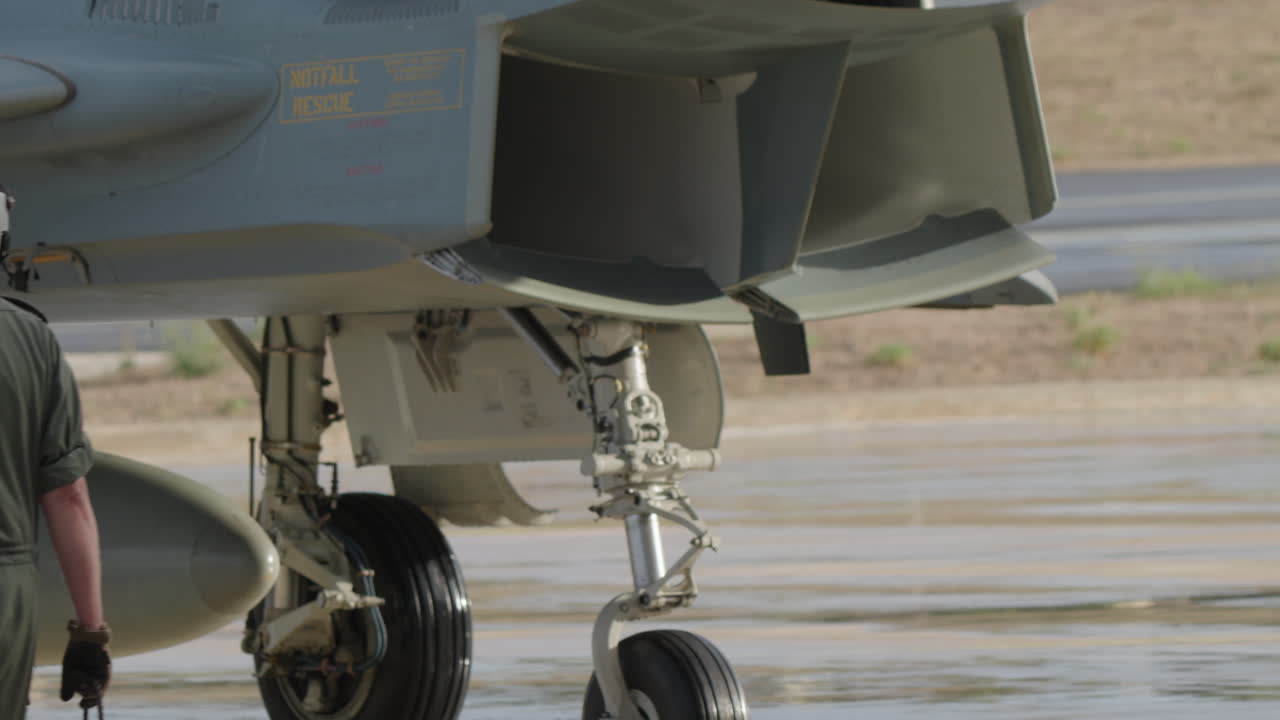Close-up of a fighter jet's landing gear