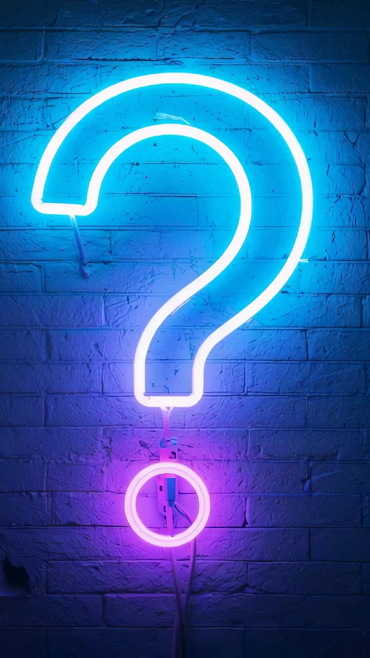 Vertical video: Power-flickering question-mark neon sign flashing at brick wall, revealing cables