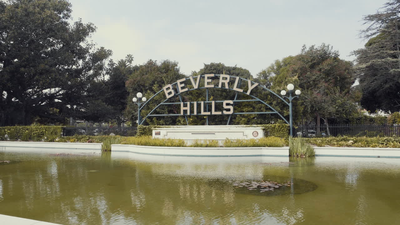 Passing by Beverly Hills sign Slow Motion Los Angeles LA California CA