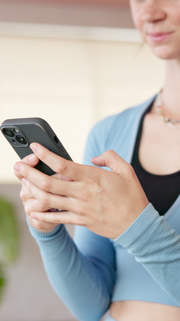 Close Up of Woman's Hands Using a Smartphone